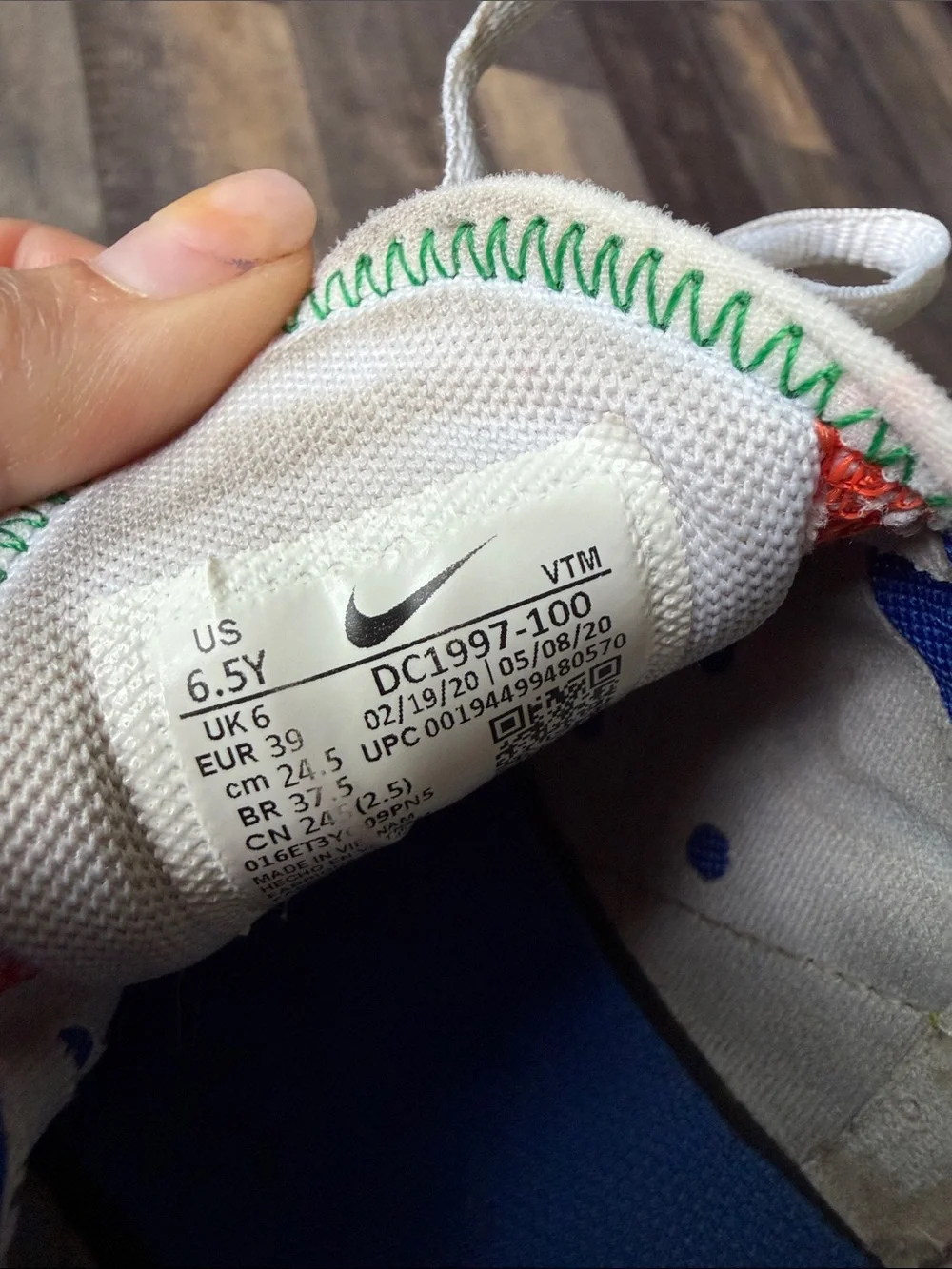 Nike Kids White Sneakers with Multicolor Accents